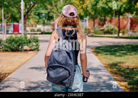 University student walking on campus Stock Photo