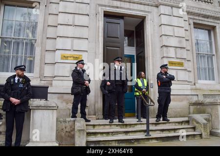 London, UK. 10th April 2024. Police officers guard the Cabinet Office during a Youth Demand protest in Whitehall. Credit: Vuk Valcic/Alamy Stock Photo