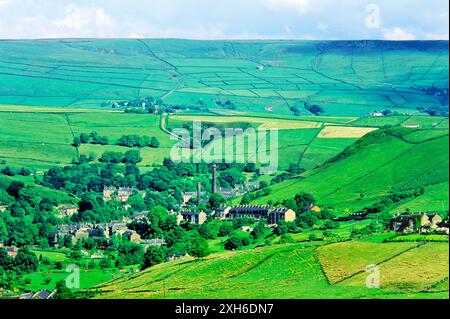 North over early industrial village of Delph in the Saddleworth Moor area of the Pennines near Oldham. 19 C. textile mill centre Stock Photo