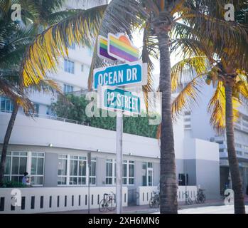 Famous Ocean Drive street name sign in the city of Miami, with a LGBTQ rainbow sign. Stock Photo