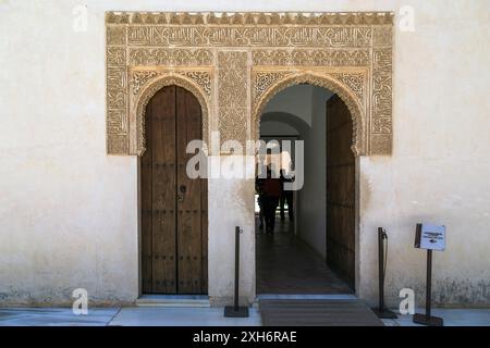 GRANADA, SPAIN - MAY 20, 2017: This is an architectural fragment of the decoration of the doorways of the  Nasrid Palace in the Alhambra. Stock Photo