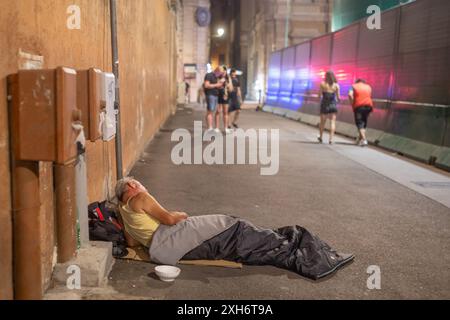 Rome, Italy - June 29, 2024: A homeless person seen on the streets of Rome, Italy. Stock Photo