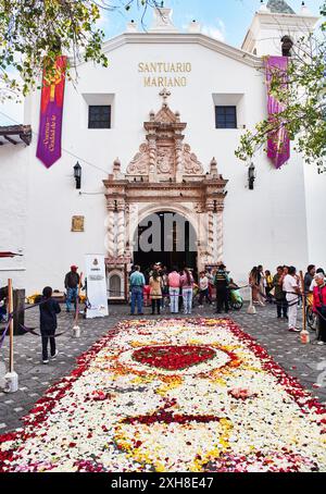 Santuario Mariano church and flower market during Easter service in the city of Cuenca, Ecuador, South America Stock Photo