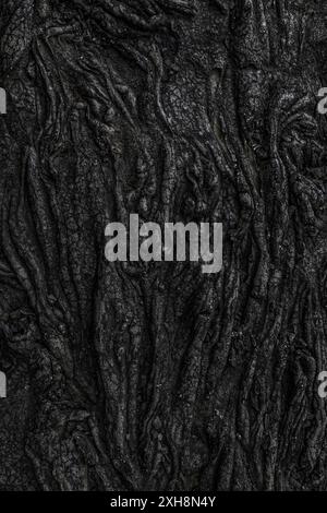 Solidified iceland lava flow forming a dark textured background Stock Photo