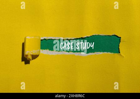 Case study message written on ripped yellow paper with green background. Conceptual case study symbol. Copy space. Stock Photo