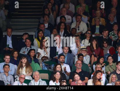 London, UK. 12th July, 2024. 12th July 2024; All England Lawn Tennis and Croquet Club, London, England; Wimbledon Tennis Tournament, Day 12; English television presenter, journalist, and writer Jeremy Clarkson sitting next to girlfriend Lisa Hogan in the stands at Centre Court watching Daniil Medvedev (RUS) vs Carlos Alcaraz (ESP), gentlemens singles semi final match Credit: Action Plus Sports Images/Alamy Live News Stock Photo