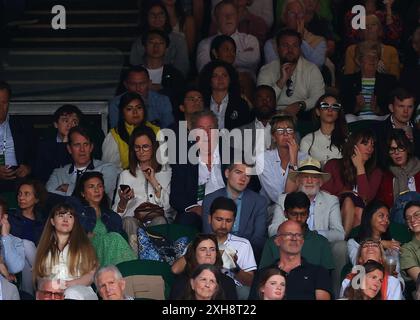 London, UK. 12th July, 2024. 12th July 2024; All England Lawn Tennis and Croquet Club, London, England; Wimbledon Tennis Tournament, Day 12; English television presenter, journalist, and writer Jeremy Clarkson sitting next to girlfriend Lisa Hogan in the stands at Centre Court watching Daniil Medvedev (RUS) vs Carlos Alcaraz (ESP), gentlemens singles semi final match Credit: Action Plus Sports Images/Alamy Live News Stock Photo