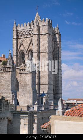 Spain, Castile and Leon, Avila, Avila Cathedral tower viewed from the walkway along the interior perimeter of the city walls that were built from 1090 onwards and are among the best-preserved and most complete in Europe. Stock Photo