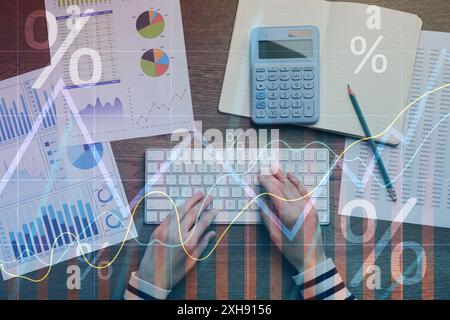 Budget concept. Graphs and woman working at table, multiple exposure Stock Photo