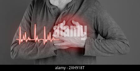 Heart attack. Man suffering from severe pain and pressing hands to chest on grey background, closeup. Banner design Stock Photo