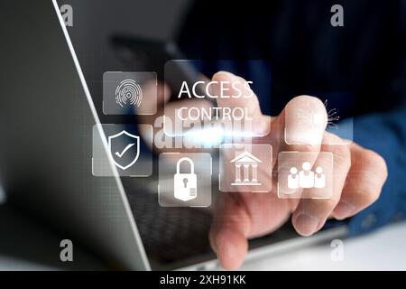 Access control concept. Businessman using mobile smartphone with virtual access control icon for access security personal data. Automatic access contr Stock Photo