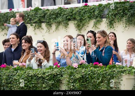 Ascot, Berkshire, UK. 12th July, 2024. Supporters of the jockeys in the Foundation Developments Property Race Day Charity Race at Ascot Racecourse at the Summer Mile Property Raceday. Credit: Maureen McLean/Alamy Live News Stock Photo