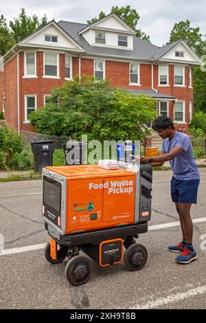 Detroit, Michigan - An experimental, autonomous robot travels the streets of Detroit's Corktown neighborhood, picking up food waste which it delivers Stock Photo