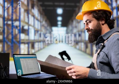 Production supervisor reading order receipts from archived folders, examining manufacturing dispatch notes to help with post service distribution. Stock manager using cargo parcel invoices. Stock Photo