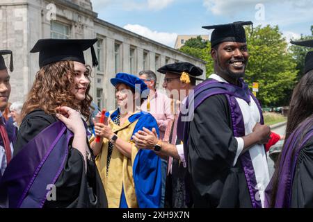 Solent University Graduation at Guildhall in Southampton on 11th July 2024, Hampshire, England, UK. Graduating students applauded by academic staff Stock Photo