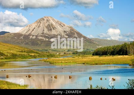 From Gweedore to white quartzite scree slopes of Errigal, County Donegal, Ireland. Lough Nacung and River Clady in foreground Stock Photo