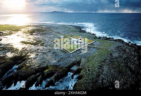 Lighthouse on Tory Island off the N.W. coast of County Donegal, Ireland. Storm approaching, shipping forecast sea area Malin Stock Photo