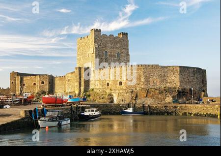 Carrickfergus Castle on the North Antrim Coast Road on shore of Belfast Lough. Norman period built by John de Courcy in 1177 Stock Photo