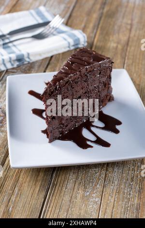A view of a layered chocolate cake. Stock Photo