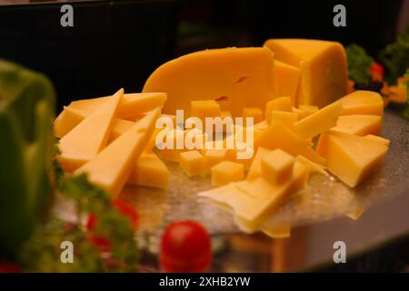 Cheese collection, piece of hard matured yellow cheddar cheese close up Stock Photo