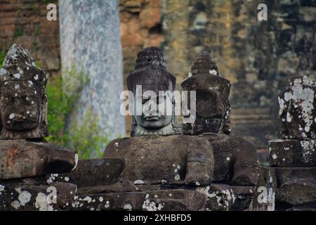 One of the temple guardians at the main gate to 12th-century, Bayon temple, Angkor Wat Complex, Siem Reap, Cambodia. Founded by King Jayavarman VII Stock Photo