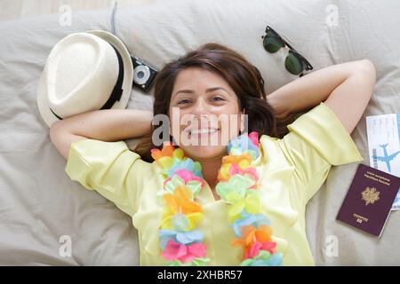 person laying on a bed Stock Photo