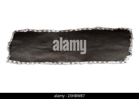 Torn black newspaper label on white background with clipping path Stock Photo