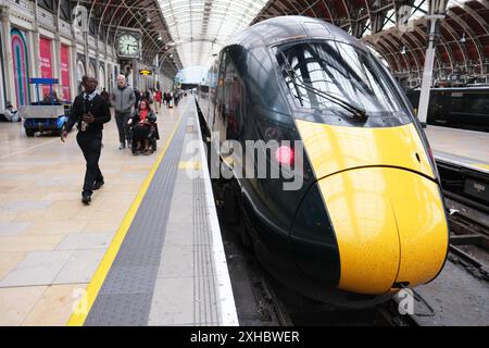 London Paddington Station GWR train and passengers at the west London rail terminus - photo July 2024 Stock Photo