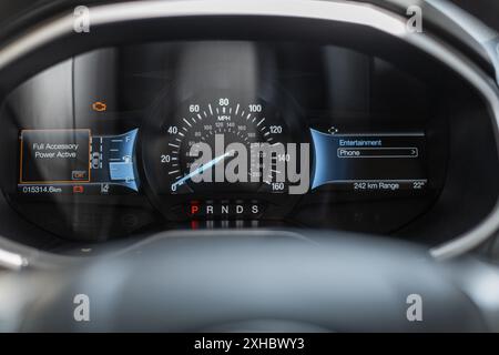 Car speedometer with infographics and information about the car. Digital panel Stock Photo