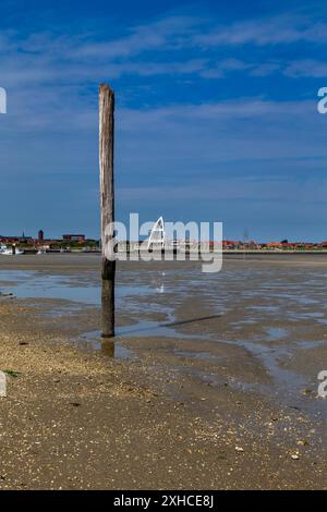 Low tide at the harbour of the East Frisian island Juist, Germany Stock Photo