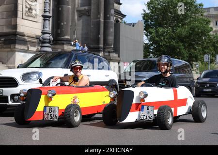 Berlin, Germany. 13th July, 2024. England and Spain fans in small cars with national flags on prior to the final taking place in Berlin, Germany. Picture date: 13th July 2024. Picture Paul Terry/Sportimage Credit: Sportimage Ltd/Alamy Live News Stock Photo