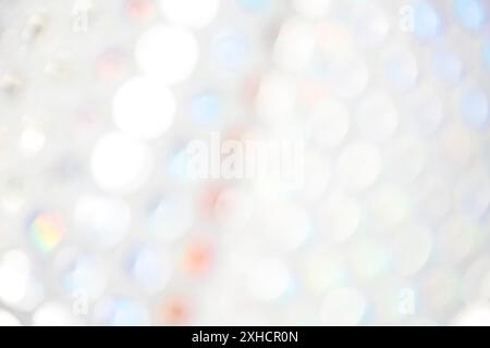 Abstract background of bright spots of lights shining with pink and blue colors Stock Photo