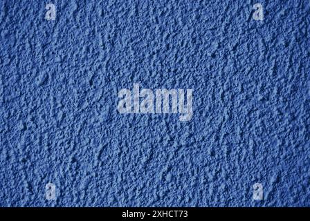 Rough unsmooth dark blue wall texture Stock Photo