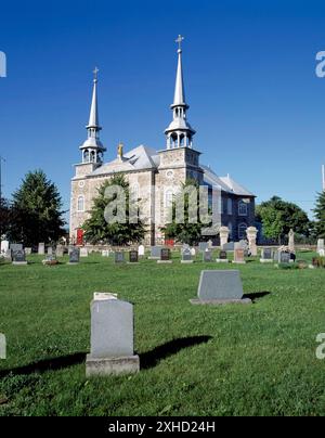 Saint-Joseph-de-Deschambault Church and cemetery in summer, Deschambault, Quebec, Canada Stock Photo