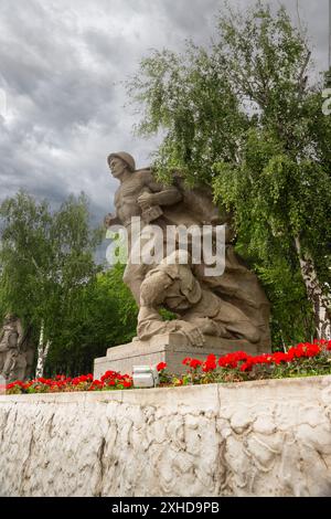 Russia, Volgograd - June 01, 2024: Sculpture Sailor on Mamayev Kurgan in honor of the heroes of the Battle of Stalingrad . Thunderclouds Stock Photo