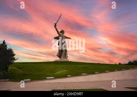 Russia, Volgograd - June 01, 2024: The statue of the Motherland is calling! Monument-ensemble to the Heroes of the Battle of Stalingrad. Dawn and clou Stock Photo