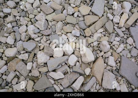 Closeup of rounded rocks and pebbles on the shores of Georgian Bay off Lake Huron Stock Photo