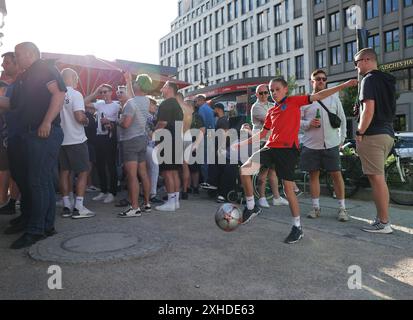 Berlin, Germany. 13th July, 2024. England fan plays football while enjoying the atmosphere prior to the final taking place in Berlin, Germany. Picture date: 13th July 2024. Picture Paul Terry/Sportimage Credit: Sportimage Ltd/Alamy Live News Stock Photo