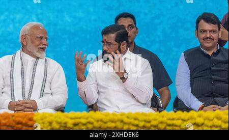 Mumbai, India. 13th July, 2024. MUMBAI, INDIA - JULY 13: Prime Minister Narendra Modi launches infrastructure projects worth Rs 29,400 crore at a function at Goregaon, on July 13, 2024 in Mumbai, India. Modi said that as per RBI report, eight crore new jobs were made available in the country in the last three to four years. Modi was speaking at an event in Mumbai's Goregaon suburb after launching and laying the foundation stone for Rs 29,000 crore projects in road, railway and port sectors in the city. (Photo by Satish Bate/Hindustan Times/Sipa USA ) Credit: Sipa USA/Alamy Live News Stock Photo