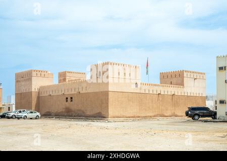 Sur Al Ayjah castle citadel fortress stone walls and towers, Sur, Oman Stock Photo