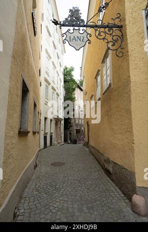 Salzburg, Austria. July 1, 2024. Glimpses of the characteristic old Steingasse in the historic city centre Stock Photo