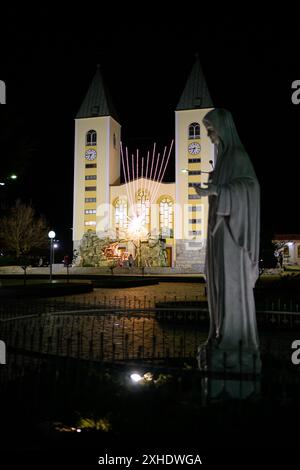 St James Church in Medjugorje at night during Christmas, Bosnia and Herzegovina. Stock Photo