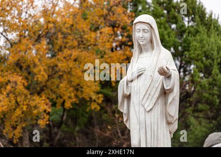 Statue of the Virgin Mary – Queen of Peace on Mount Podbrdo, the Apparition hill overlooking the village of Medjugorje in Bosnia and Herzegovina. Stock Photo