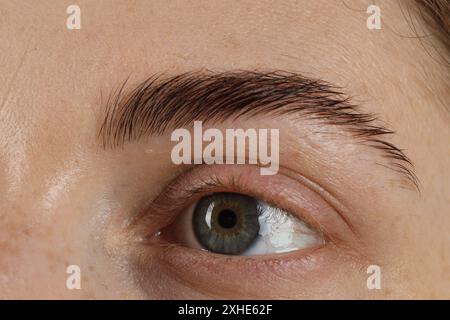 Macro photo of woman with beautiful eyes Stock Photo