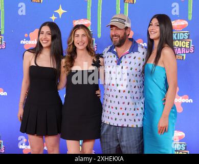 Santa Monica, United States. 13th July, 2024. (L-R) Sadie Sandler, Jackie Sandler, Adam Sandler and Sunny Sandler attend the 2024 Nickelodeon's Kids' Choice Awards at Barker Hangar in Santa Monica on Saturday, July 13, 2024. Photo by Greg Grudt/UPI Credit: UPI/Alamy Live News Stock Photo