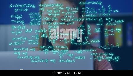 Image of equations and data processing over caucasian female student studying. Global education, learning, school, digital interface and data processi Stock Photo