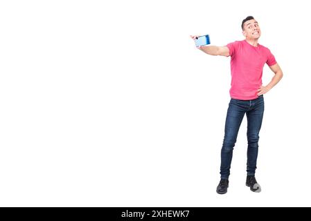 Cheerful young guy taking selfie on smartphone isolated on white background Stock Photo
