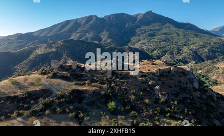 aerial view of the ruins of the castle of Turon in the municipality of Malaga, Andalusia. Stock Photo