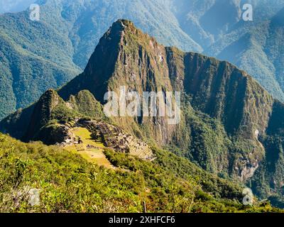 Stunning aerial view of the lost inca city Machu Picchu from Machu Picchu mountain, Sacred valley of Incas, Cusco region, Peru Stock Photo