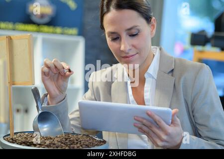 coffee worker checking the coffee beams quality Stock Photo